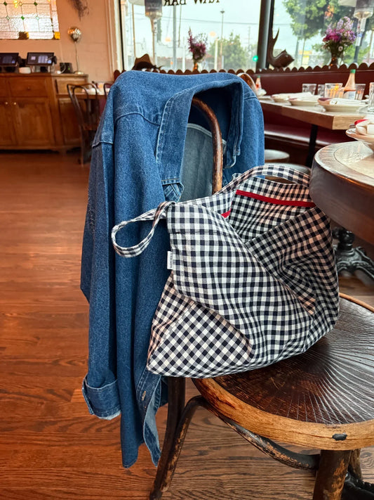 Le Bon Shoppe Carry Bag on chair